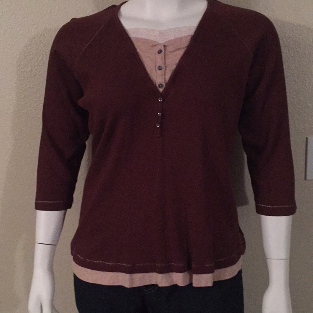 Brown shirt with accent colors and sparkly trim.